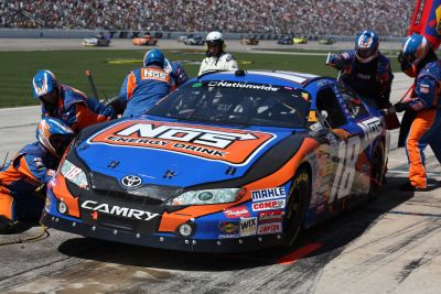 Kyle Busch makes a pit stop during the O’Reilly 300. Photo by George Walker