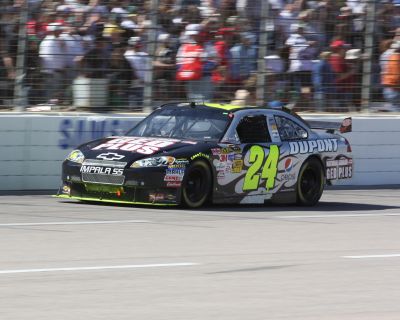 Jeff Gordon leading the Samsung 500 NASCAR Sprint Cup Series race at Texas Motor Speedway.  Photo by George Walker