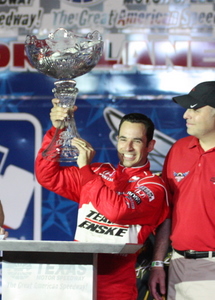 Helio Castroneves celebrates in Victory Lane at Texas Motor Speedway.  Photo by George Walker.